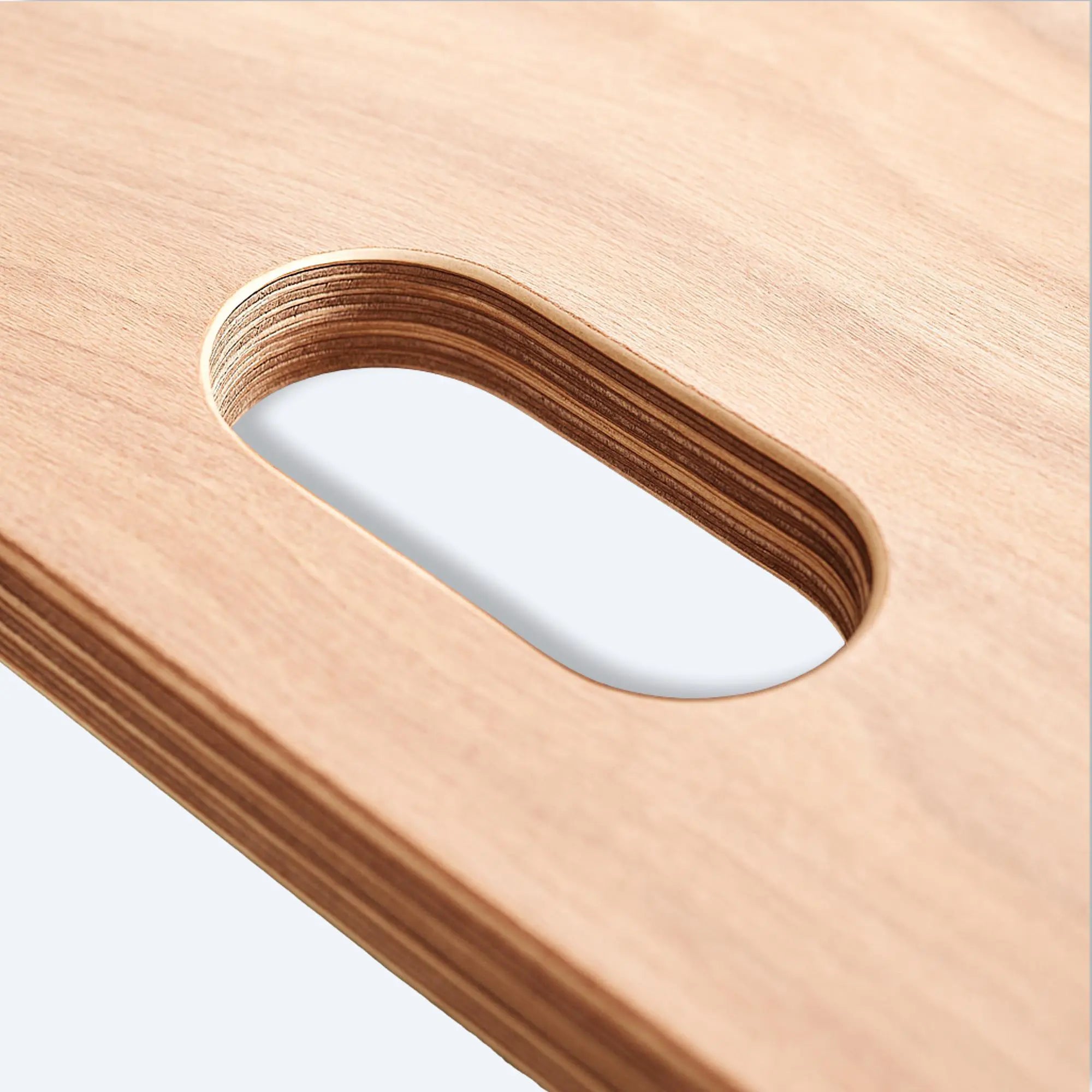 cart-handle-detail.jpg Macro shot of layered plywood handle cut‑out on dolly cart, showing smooth edges and water‑resistant finish.