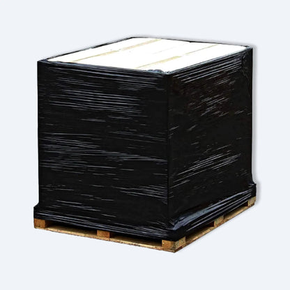 Wooden pallet fully wrapped with opaque black stretch film for secure shipping