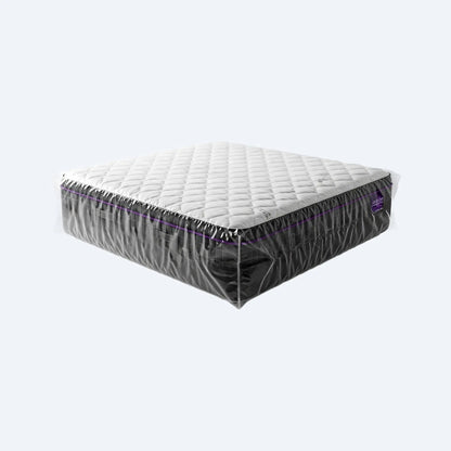 Full queen‑size mattress fully wrapped in a giant clear plastic storage bag, showcasing complete dust‑free coverage.