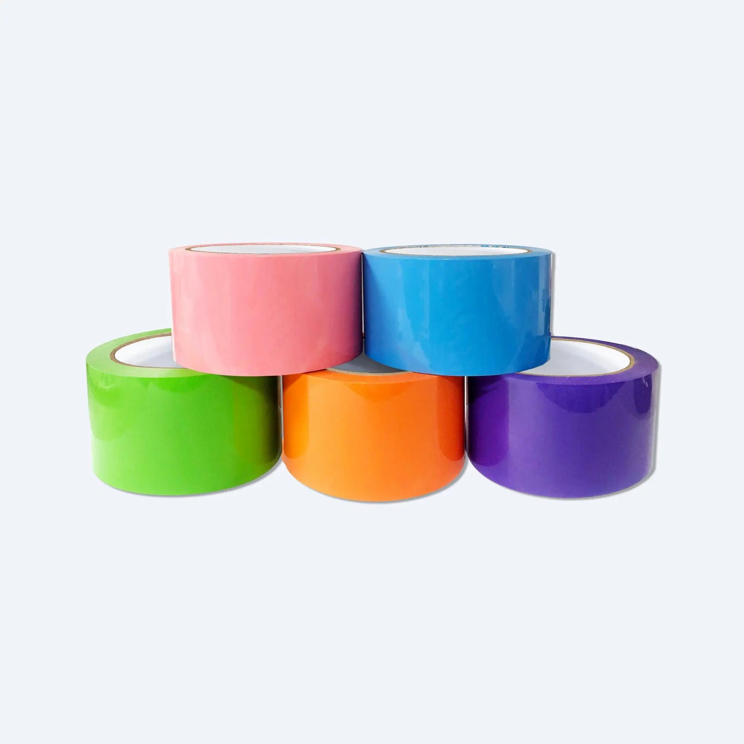 五卷堆疊在一起封箱膠紙，粉紅色、藍色、綠色、橙色、紫色的封箱膠紙