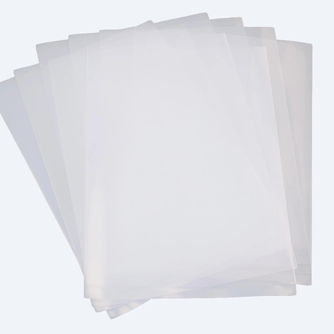 Fan display of multiple transparent PE flat open‑mouth bags, highlighting smooth edges and clarity.