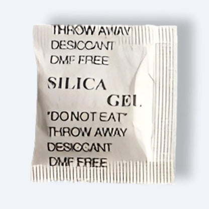 Close‑up of EPACKBOX 1‑gram silica‑gel desiccant packet for protecting electronics, shoes or small parcels from moisture.